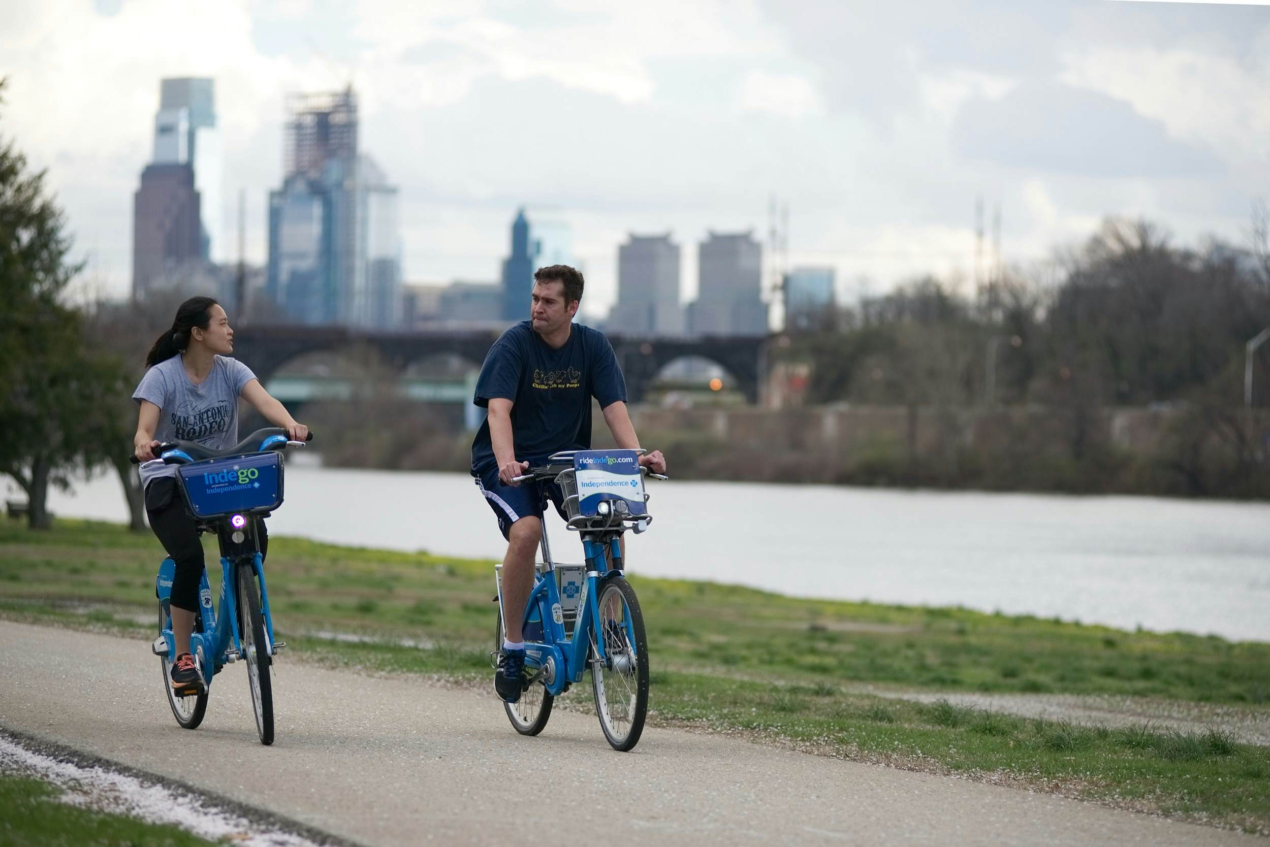 Cyclist on Indego Bike Share bikes tour along the Cherry blossoms in full bloom along Kelly Drive on the Schuylkill River Banks, in the Fairmount Park section of Philadelphia, PA, on April 4, 2017. (Photo by Bastiaan Slabbers/NurPhoto)